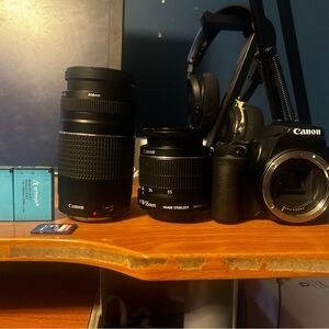 Canon 250d Body Canon 16-55 Lens Canon 75-300 Lens Two Batteries